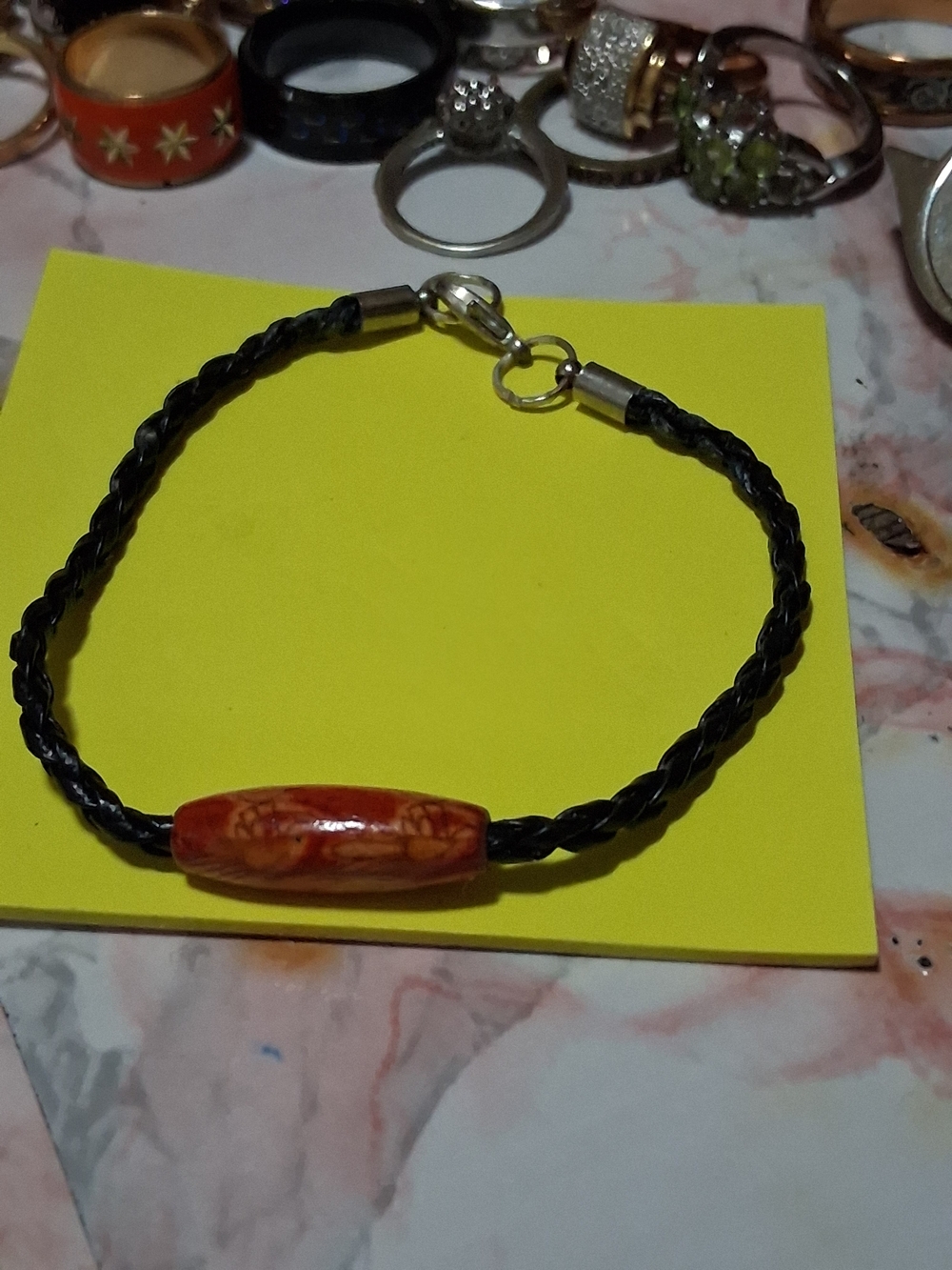Handmade Black Braided Leather Bracelet with Orange Bead